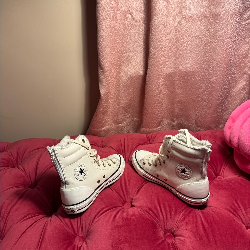 Fur lined high top Converse sneakers with a back zipper
